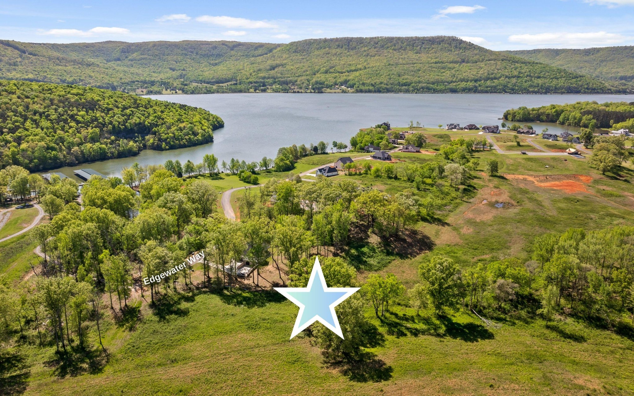 a view of a lake with a mountain in the background