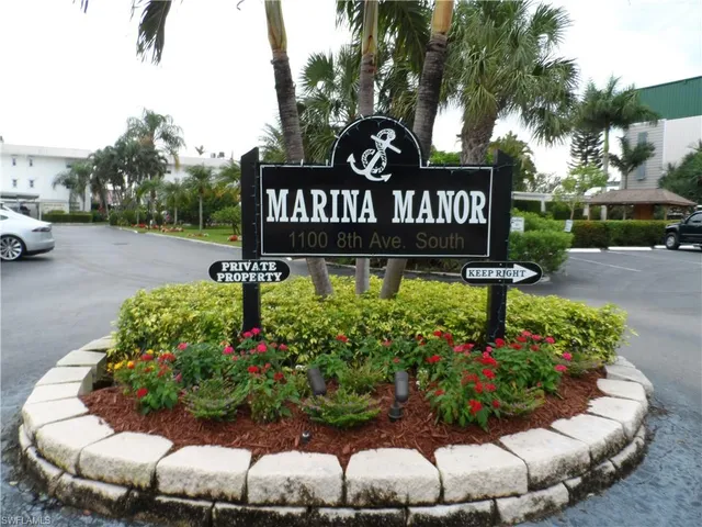 a view of a chairs and table in a garden