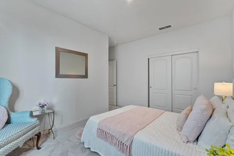a view of a bathroom from a hallway
