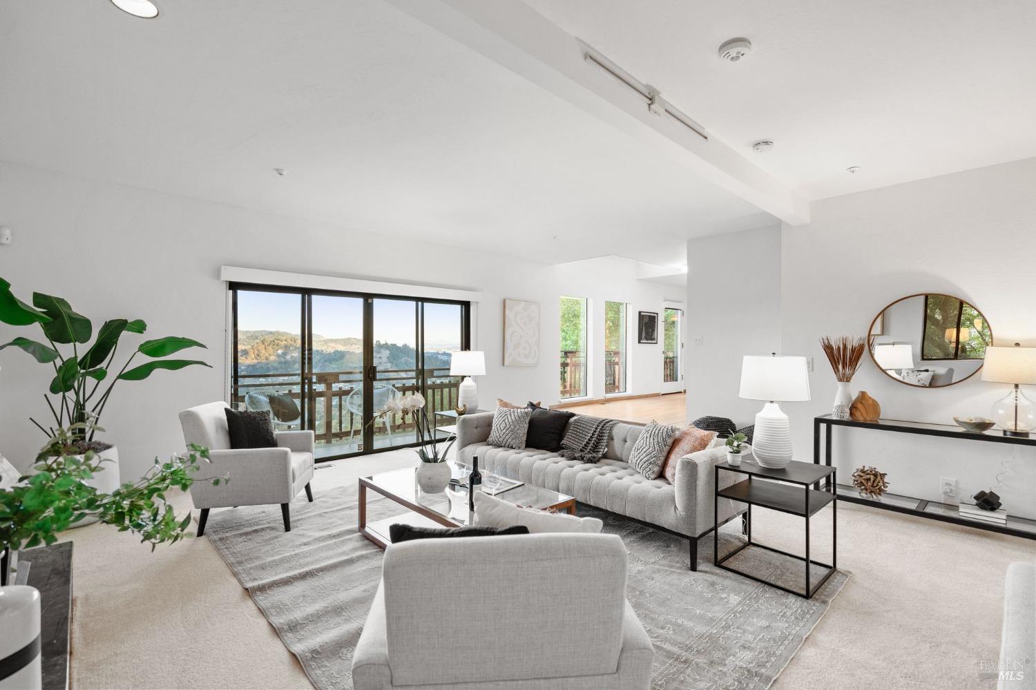 29 Summit Road San Anselmo, CA 94960 - Photo 1 of 1 a living room with furniture and a window
