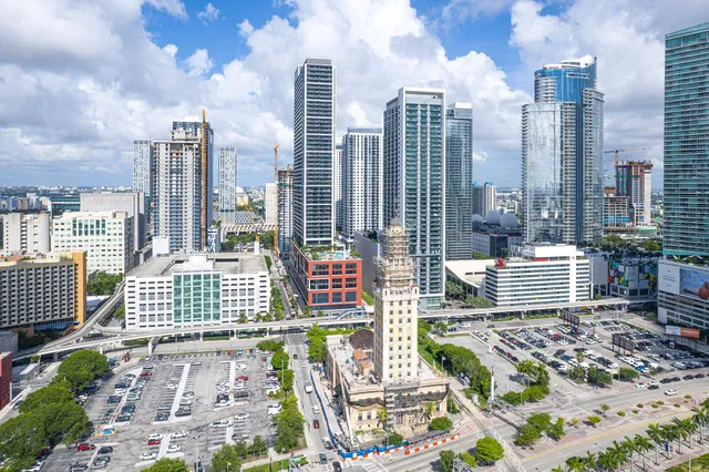 a view of a patio with a table and chairs