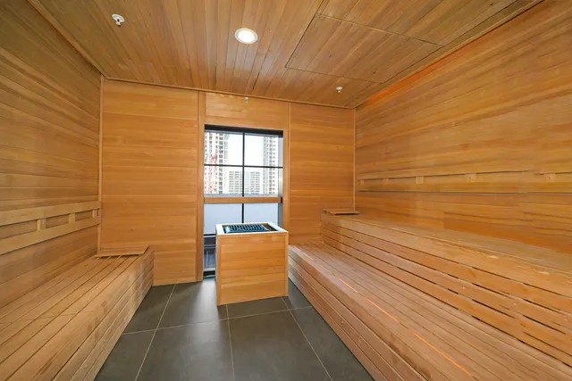 a gym room with lots of gym equipment