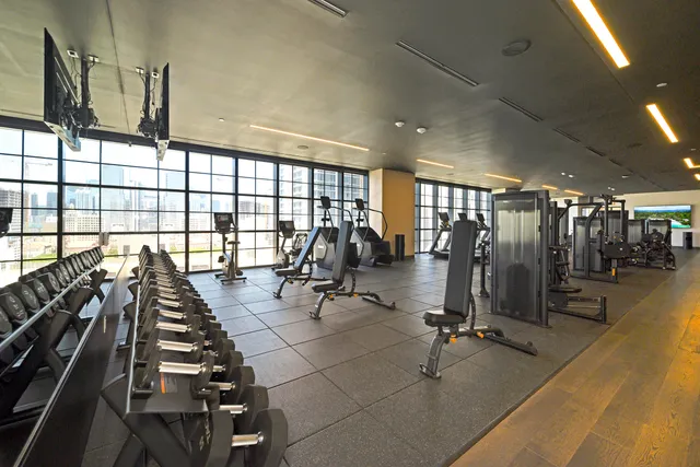 a lobby with furniture and lots of table