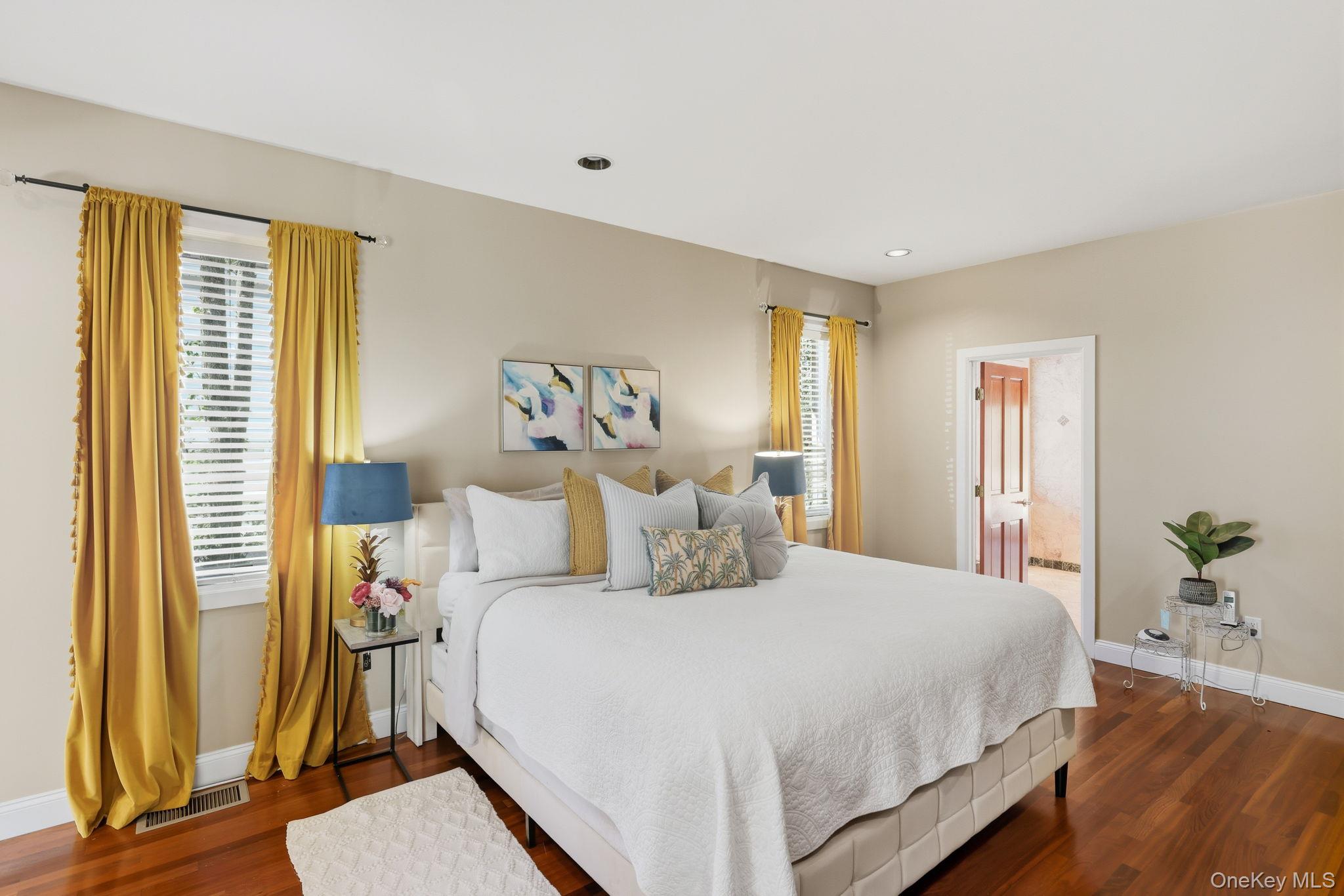 45 Evergreen Avenue Poughkeepsie, NY 12601 - Photo 20 of 43 a bedroom with a bed and wooden floor