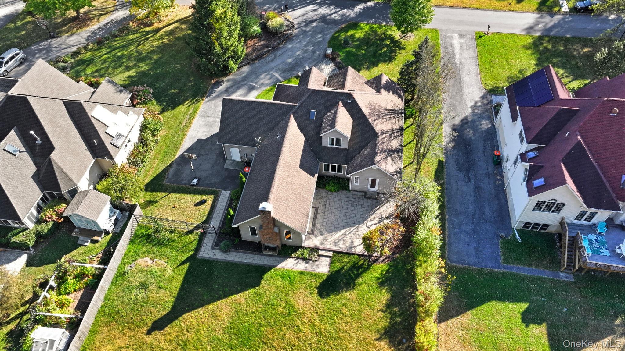 45 Evergreen Avenue Poughkeepsie, NY 12601 - Photo 38 of 43 an aerial view of a house with a yard and balcony