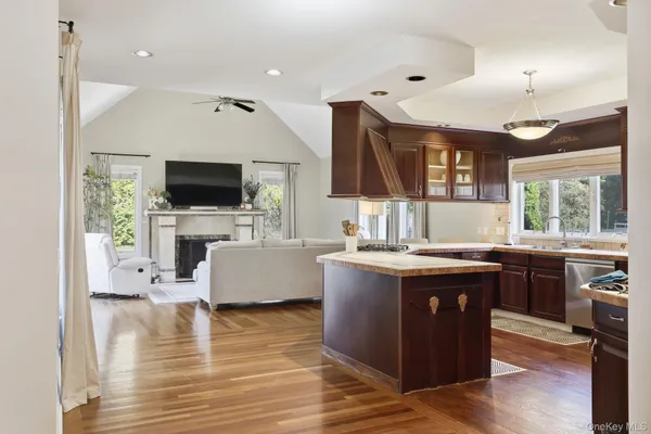 a kitchen with a stove a sink and a refrigerator