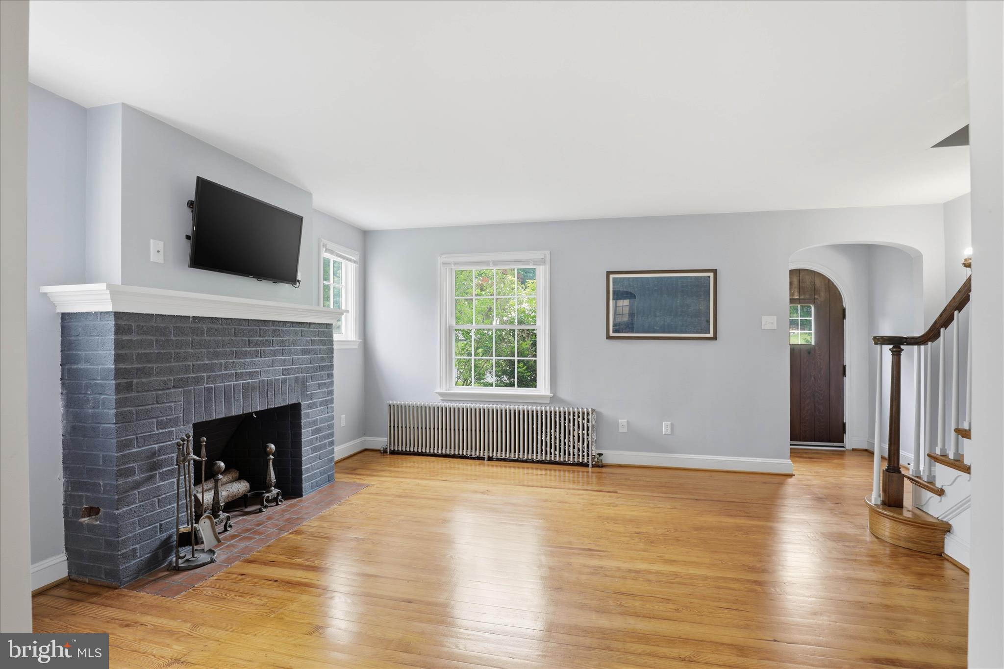 169 School House Road Lancaster, PA 17603 - Photo 5 of 39 a living room with fireplace furniture and a flat screen tv