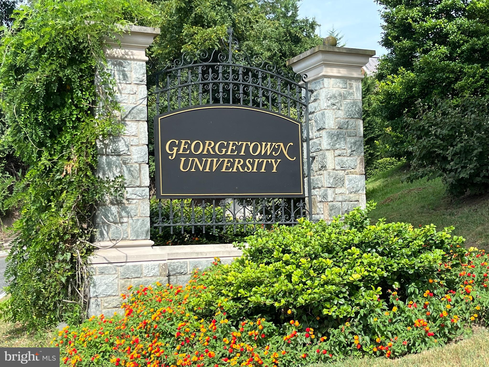 1318 35th Street Northwest, Unit 7 Washington, DC 20007 - Photo 21 of 27 a sign on the side of a building