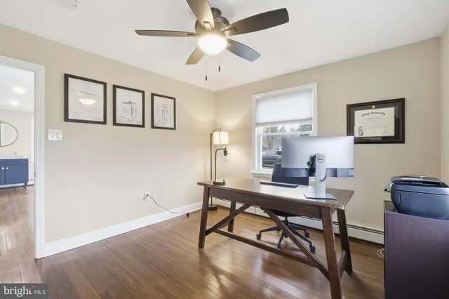a view of a workspace with furniture