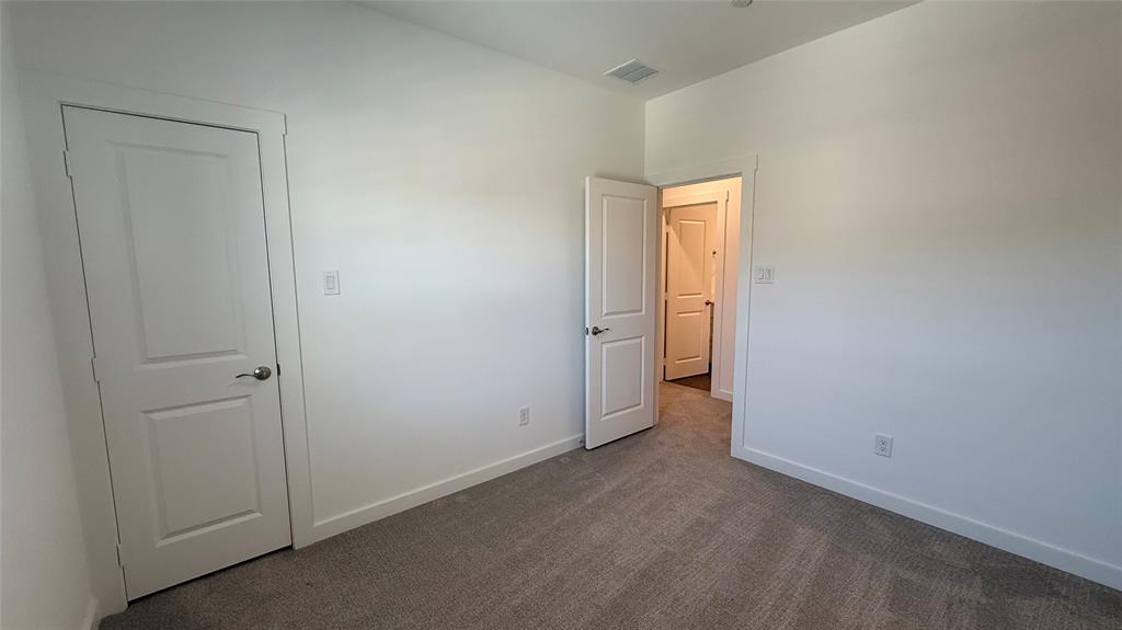 2805 Concord Drive Wylie, TX 75098 - Photo 17 of 19 an empty room that has a grey walls and closet