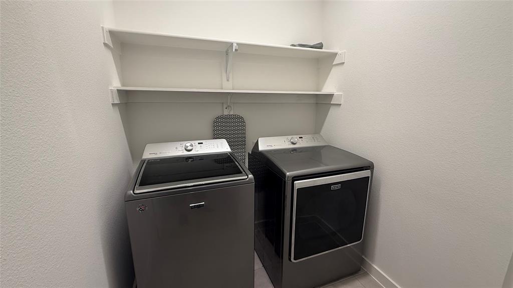 2805 Concord Drive Wylie, TX 75098 - Photo 19 of 19 a utility room with dryer and washer