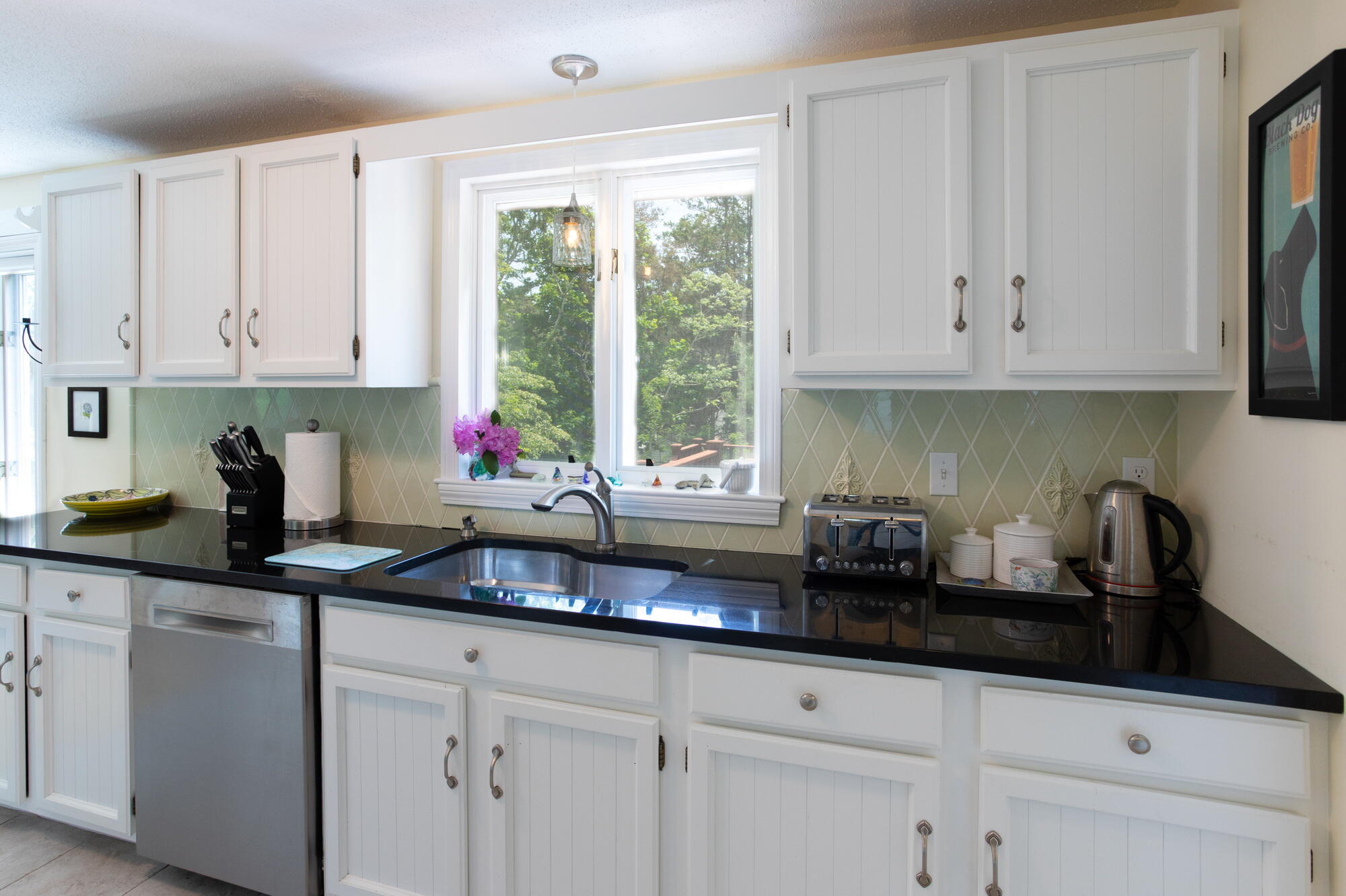 21 Captain Isiah's Road Cotuit, MA 02635 - Photo 12 of 47 a kitchen with granite countertop white cabinets white appliances and a sink