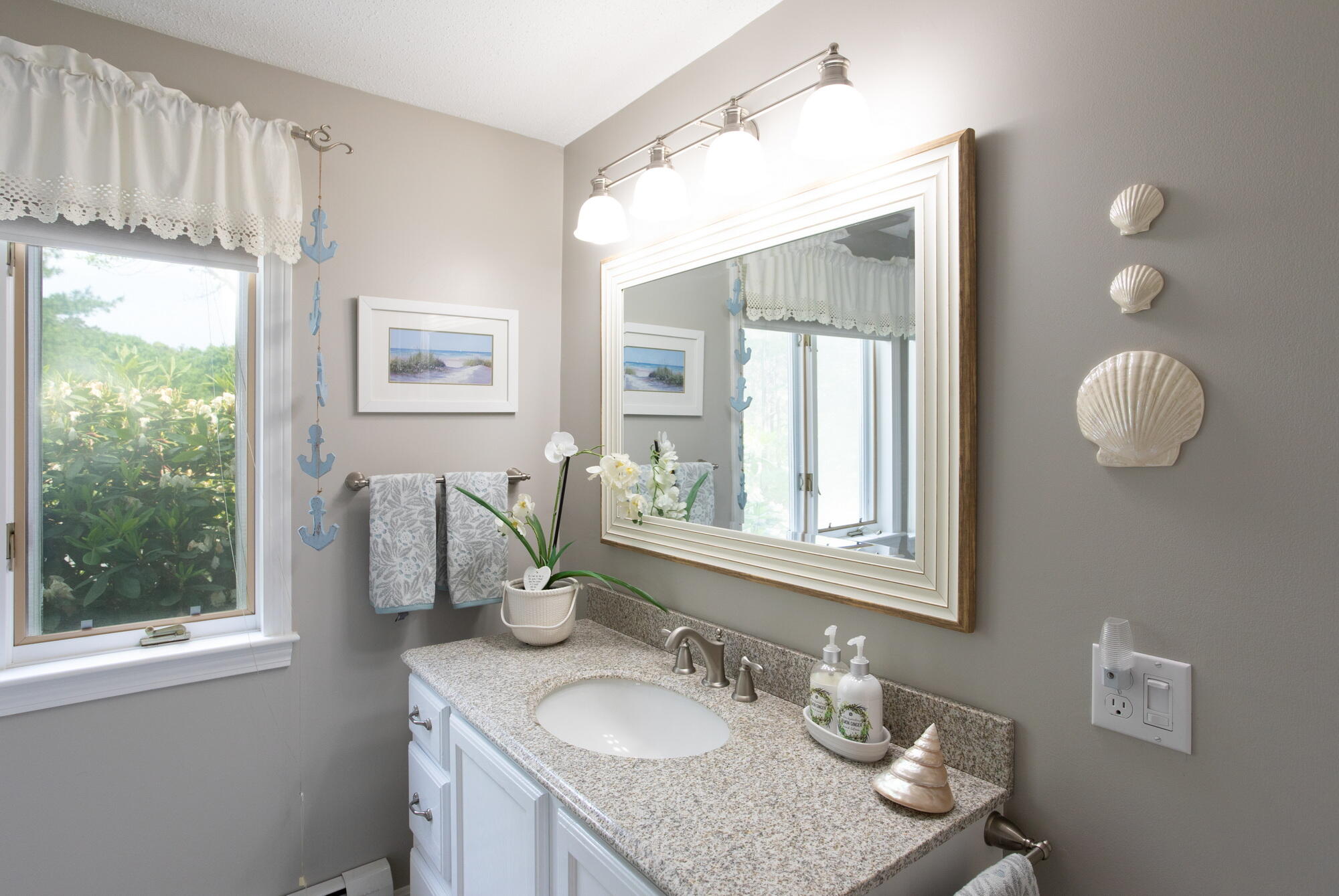21 Captain Isiah's Road Cotuit, MA 02635 - Photo 16 of 47 a bathroom with a granite countertop sink mirror and window