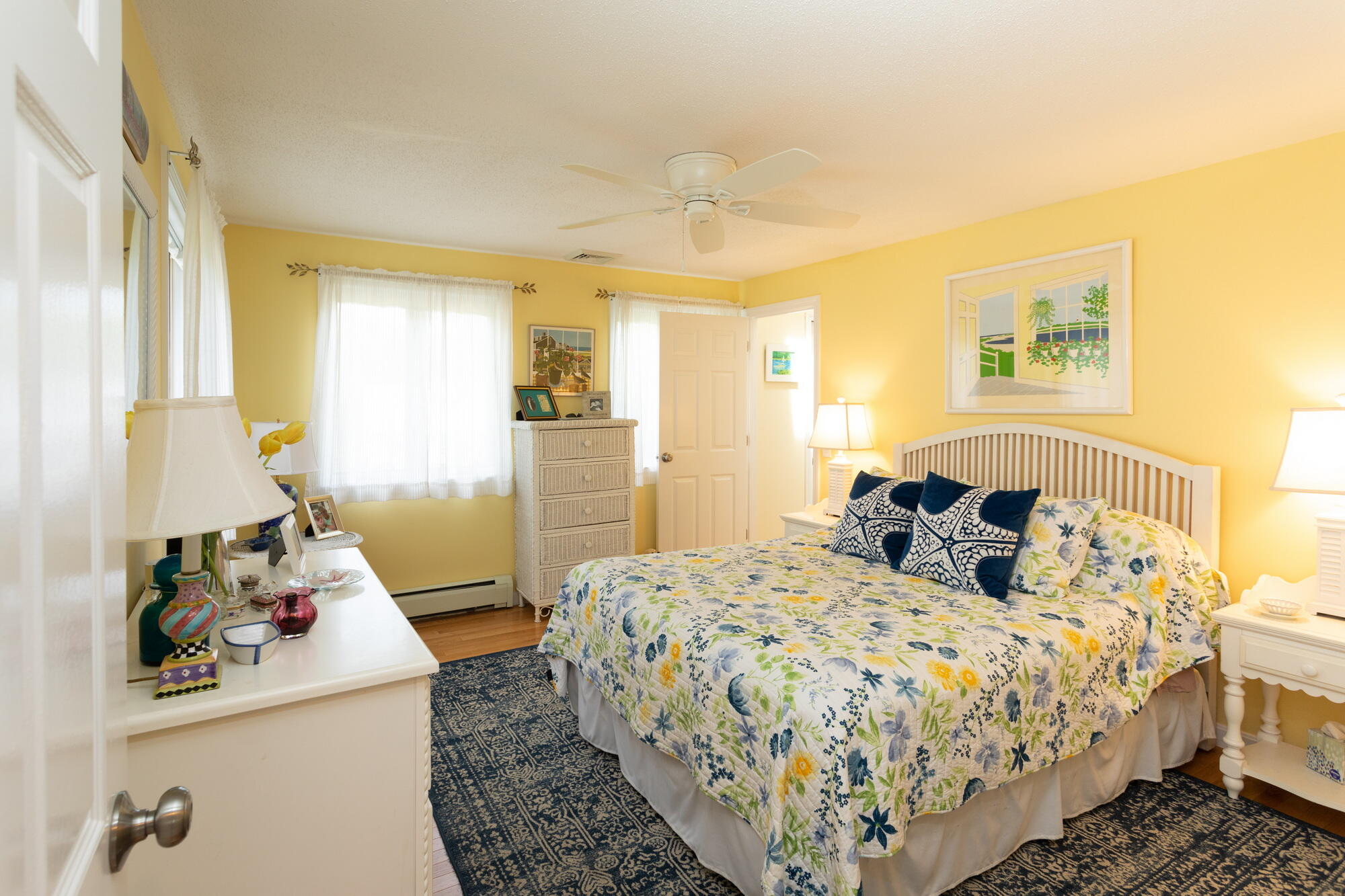 21 Captain Isiah's Road Cotuit, MA 02635 - Photo 17 of 47 a bed room with a bed and a couch