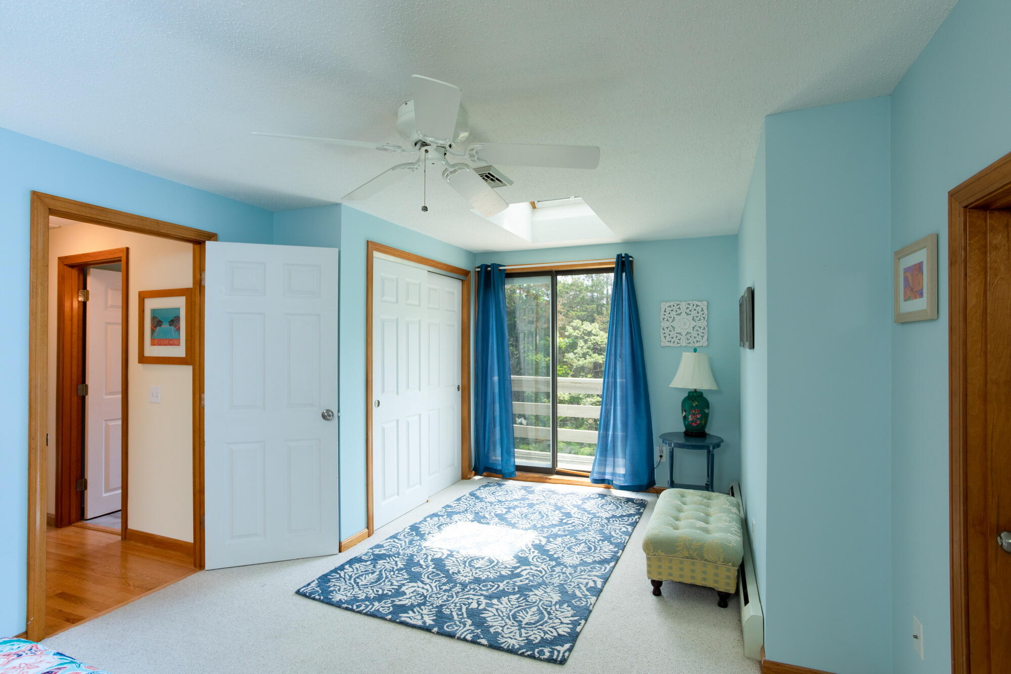 21 Captain Isiah's Road Cotuit, MA 02635 - Photo 21 of 47 a spacious bedroom with a bed and a window