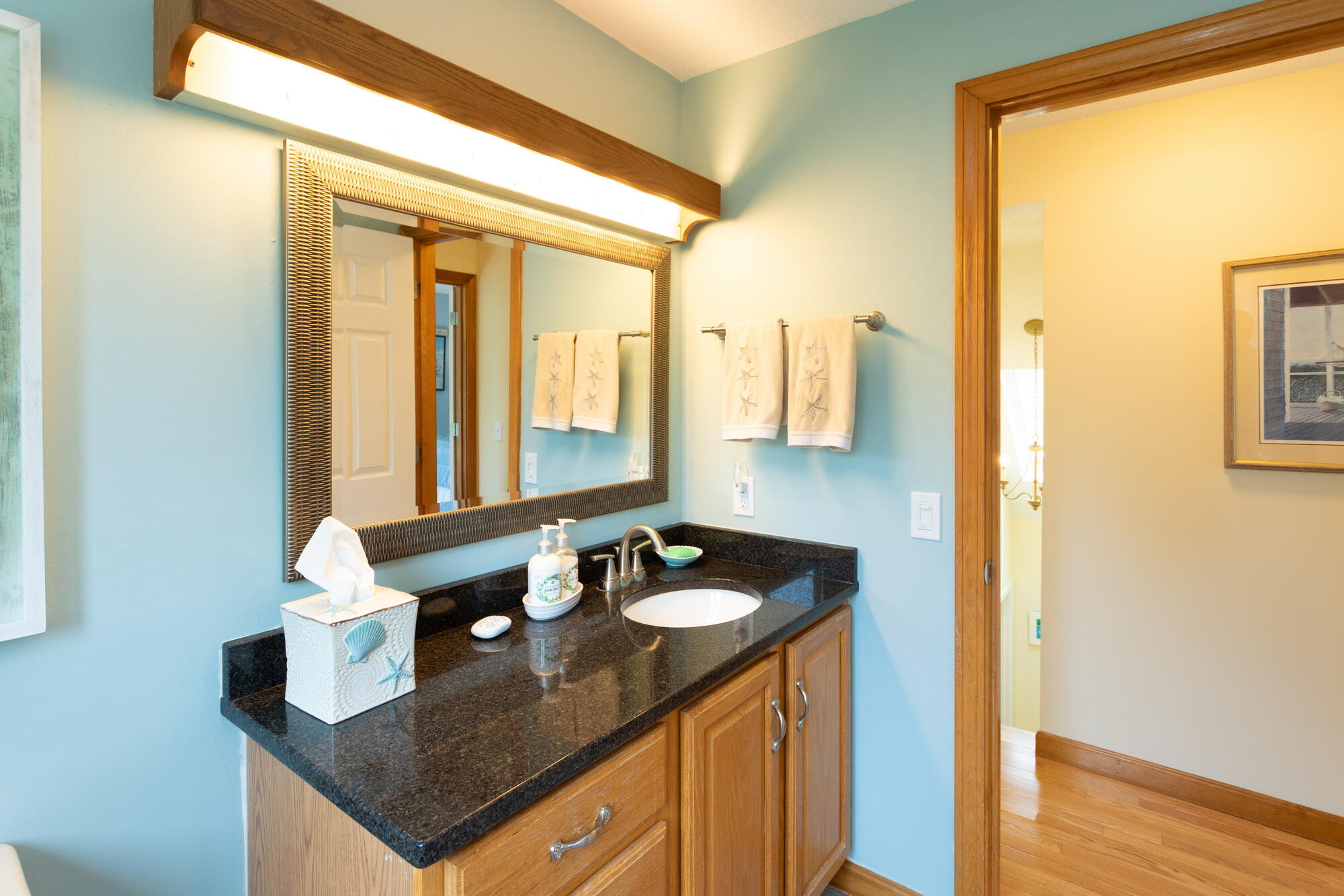 21 Captain Isiah's Road Cotuit, MA 02635 - Photo 25 of 47 a bathroom with a sink double vanity and a mirror