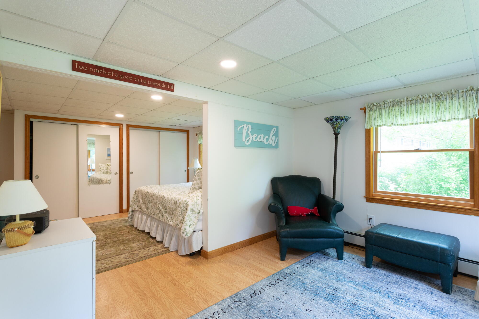 21 Captain Isiah's Road Cotuit, MA 02635 - Photo 30 of 47 a living room with furniture and a window