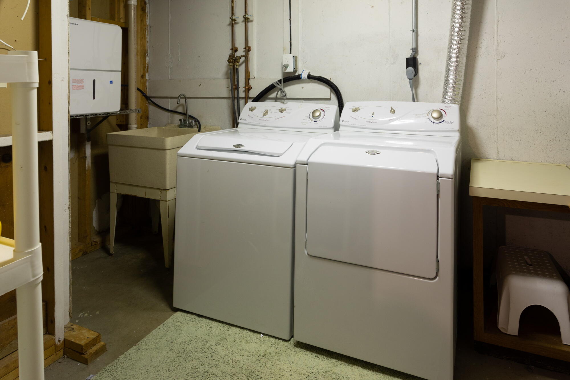 21 Captain Isiah's Road Cotuit, MA 02635 - Photo 39 of 47 a utility room with dryer and washer