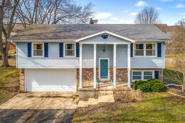 5001 Tile Line Road Crystal Lake, IL 60012 - Photo 2 of 30 a front view of a house with a yard