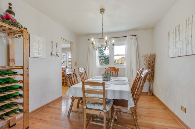 5001 Tile Line Road Crystal Lake, IL 60012 - Photo 15 of 30 a view of a dining room with furniture window and wooden floor