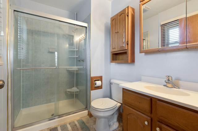 5001 Tile Line Road Crystal Lake, IL 60012 - Photo 19 of 30 a bathroom with a sink toilet and shower