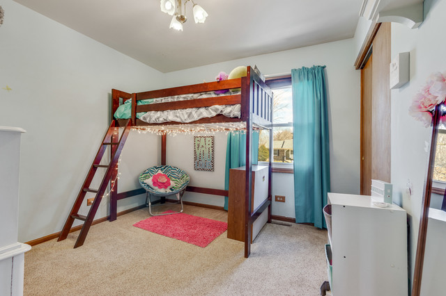 5001 Tile Line Road Crystal Lake, IL 60012 - Photo 20 of 30 a bedroom with furniture and a window