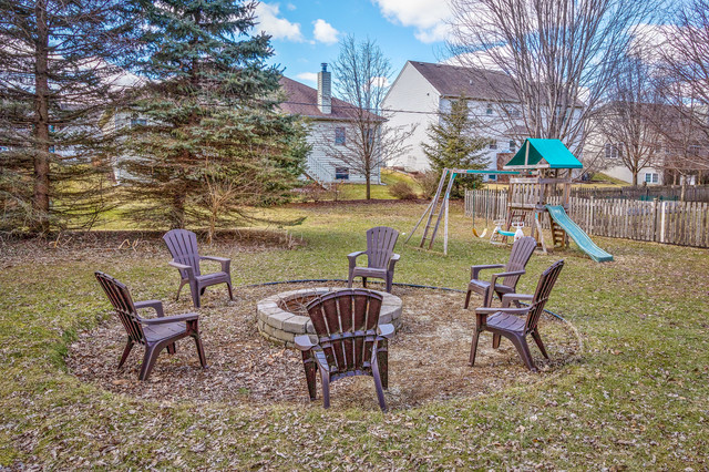 5001 Tile Line Road Crystal Lake, IL 60012 - Photo 30 of 30 a view of a chairs and table in backyard