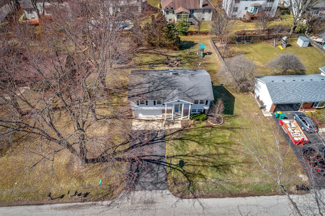 5001 Tile Line Road Crystal Lake, IL 60012 - Photo 4 of 30 a picture of houses with outdoor space