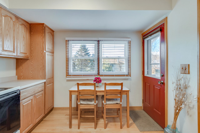 5001 Tile Line Road Crystal Lake, IL 60012 - Photo 9 of 30 a view of a kitchen with furniture and windows
