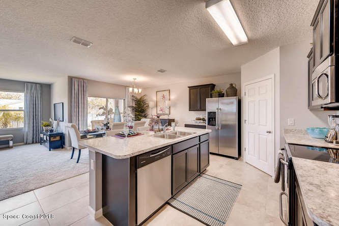 249 Abalone Road Northwest Palm Bay, FL 32907 - Photo 4 of 14 Cali-small-007-11-Kitchen-666x445-72dpi