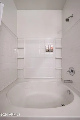 a close view of a shower in the bathroom