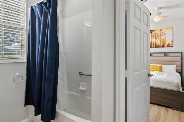 a bathroom with double sink and a mirror