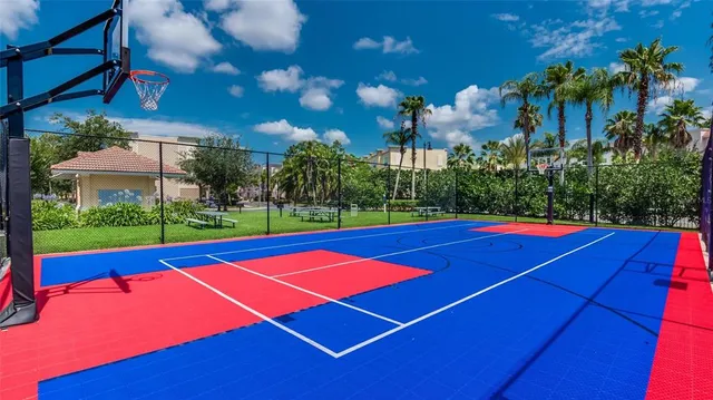 a view of deck with chairs and wooden fence