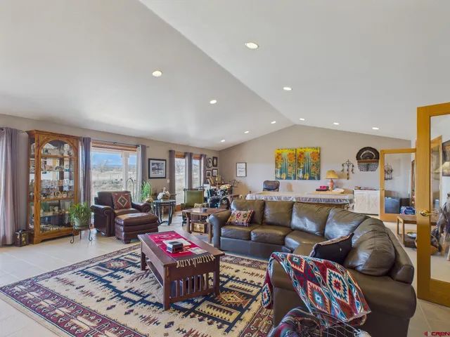 a kitchen with a sink a stove and cabinets