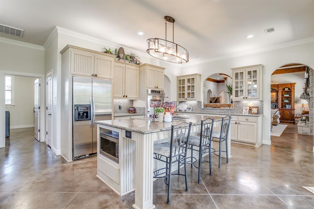4991 Old Millsap Road Millsap, TX 76066 - Photo 13 of 40 a view of a dining area with furniture