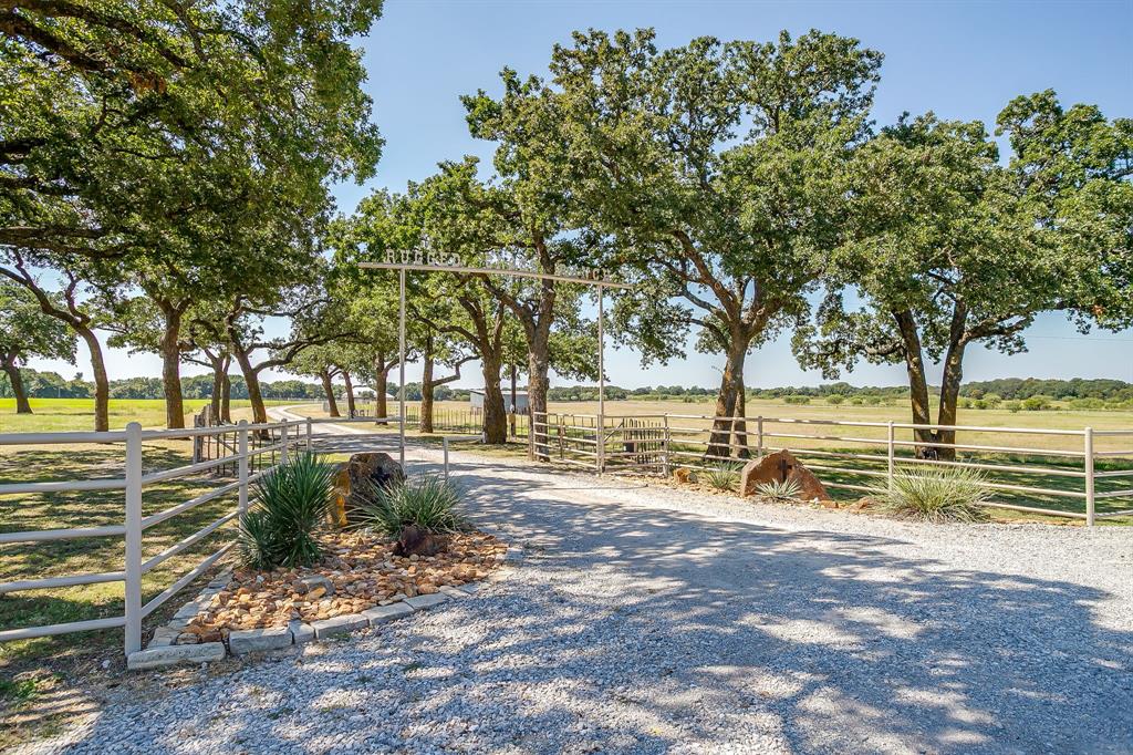 4991 Old Millsap Road Millsap, TX 76066 - Photo 2 of 40 a view of a park with large trees