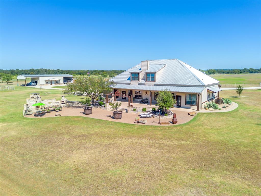 4991 Old Millsap Road Millsap, TX 76066 - Photo 31 of 40 a view of a patio with swimming pool and furniture