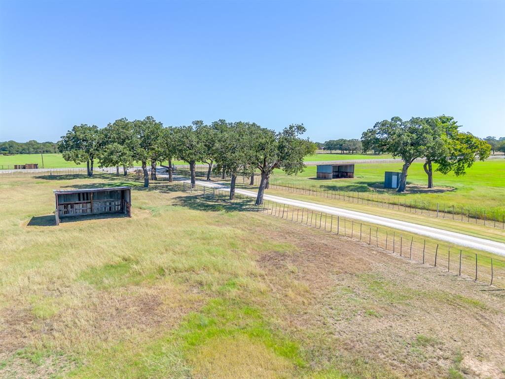 4991 Old Millsap Road Millsap, TX 76066 - Photo 37 of 40 a swimming pool with trees in the background