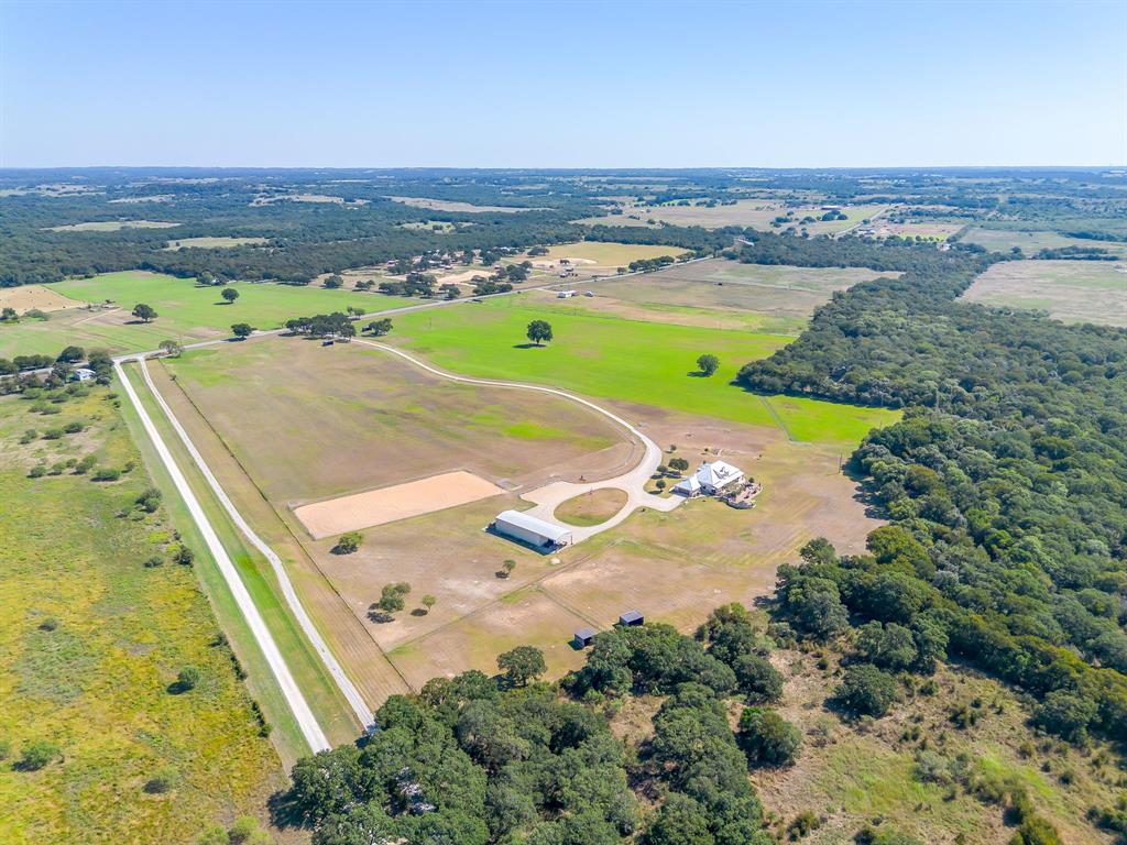 4991 Old Millsap Road Millsap, TX 76066 - Photo 38 of 40 an aerial view of a residential houses with outdoor space