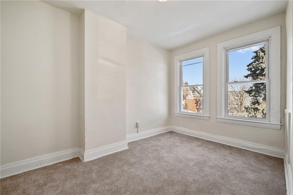 8 Edith Place Pittsburgh, PA 15213 - Photo 13 of 24 an empty room with windows