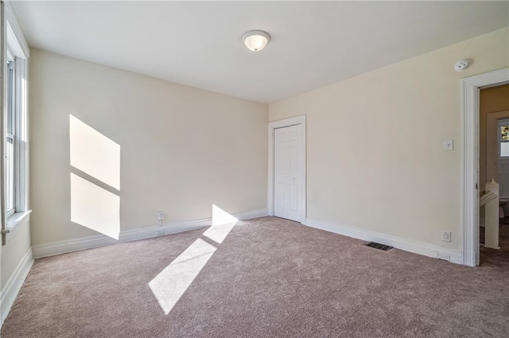 8 Edith Place Pittsburgh, PA 15213 - Photo 18 of 24 a view of an empty room with a window