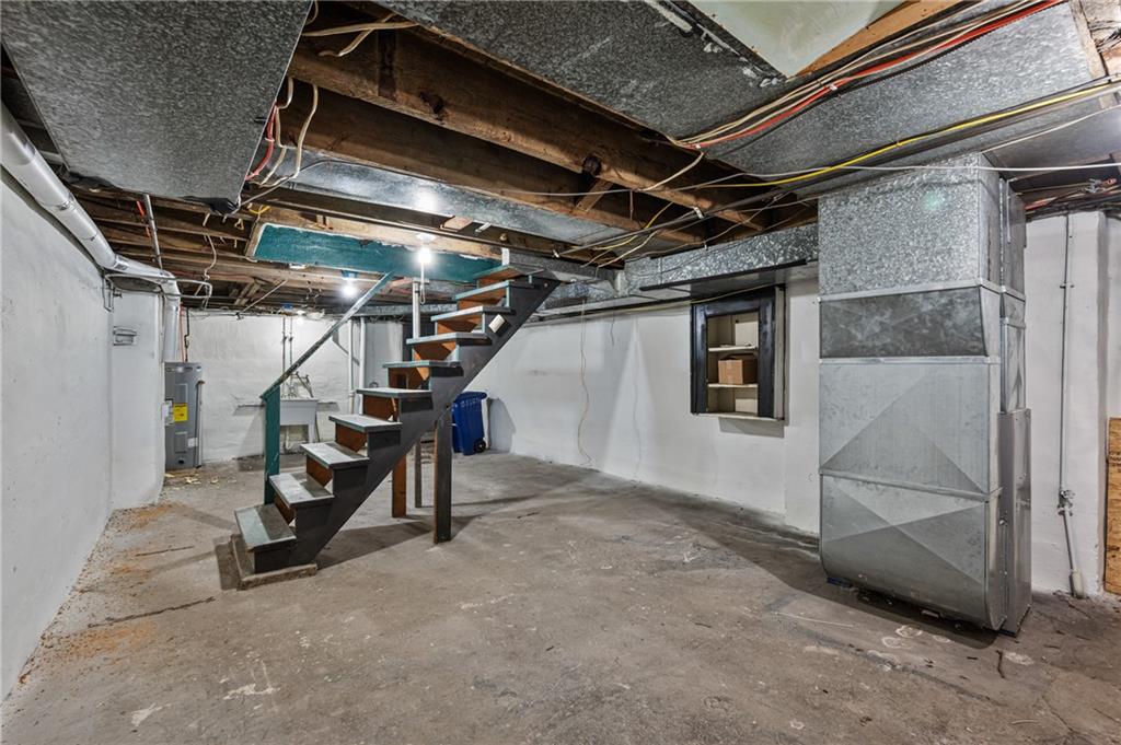 8 Edith Place Pittsburgh, PA 15213 - Photo 20 of 24 a view of an empty room with wooden floor