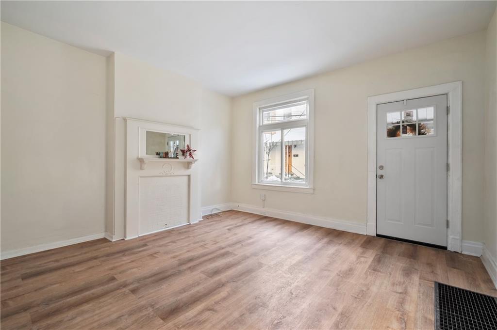 8 Edith Place Pittsburgh, PA 15213 - Photo 2 of 24 an empty room with windows and closet