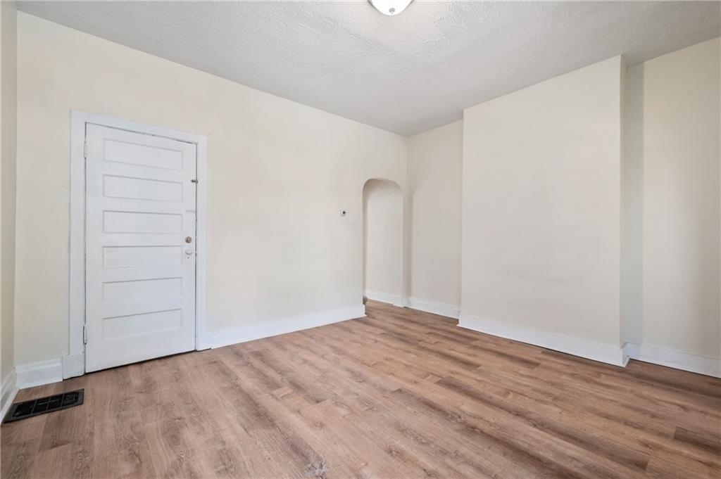 8 Edith Place Pittsburgh, PA 15213 - Photo 8 of 24 wooden floor in an empty room