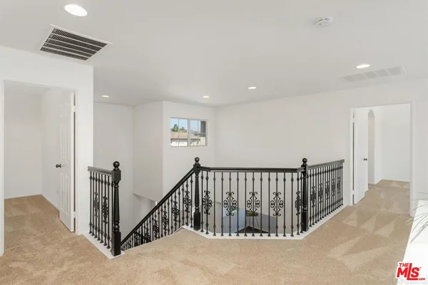 a view of hallway with stairs