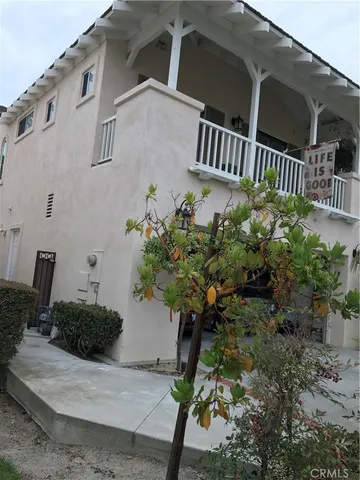 a flower plants with wooden fence