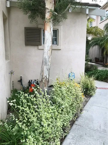 a house with a flower garden