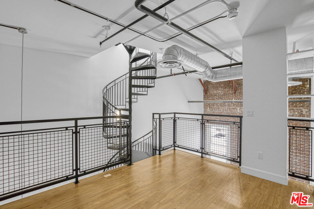 253 South Broadway, Unit 507 Los Angeles, CA 90012 - Photo 20 of 33 a view of entryway with stairs and wooden floor