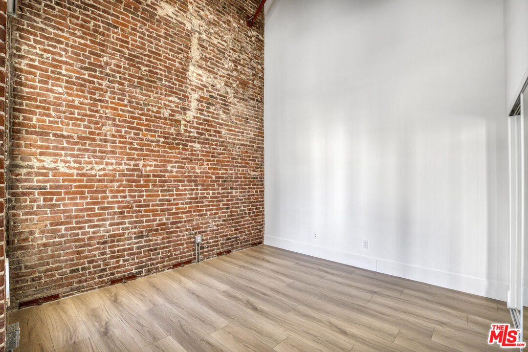 253 South Broadway, Unit 507 Los Angeles, CA 90012 - Photo 8 of 33 a view of a wooden floor