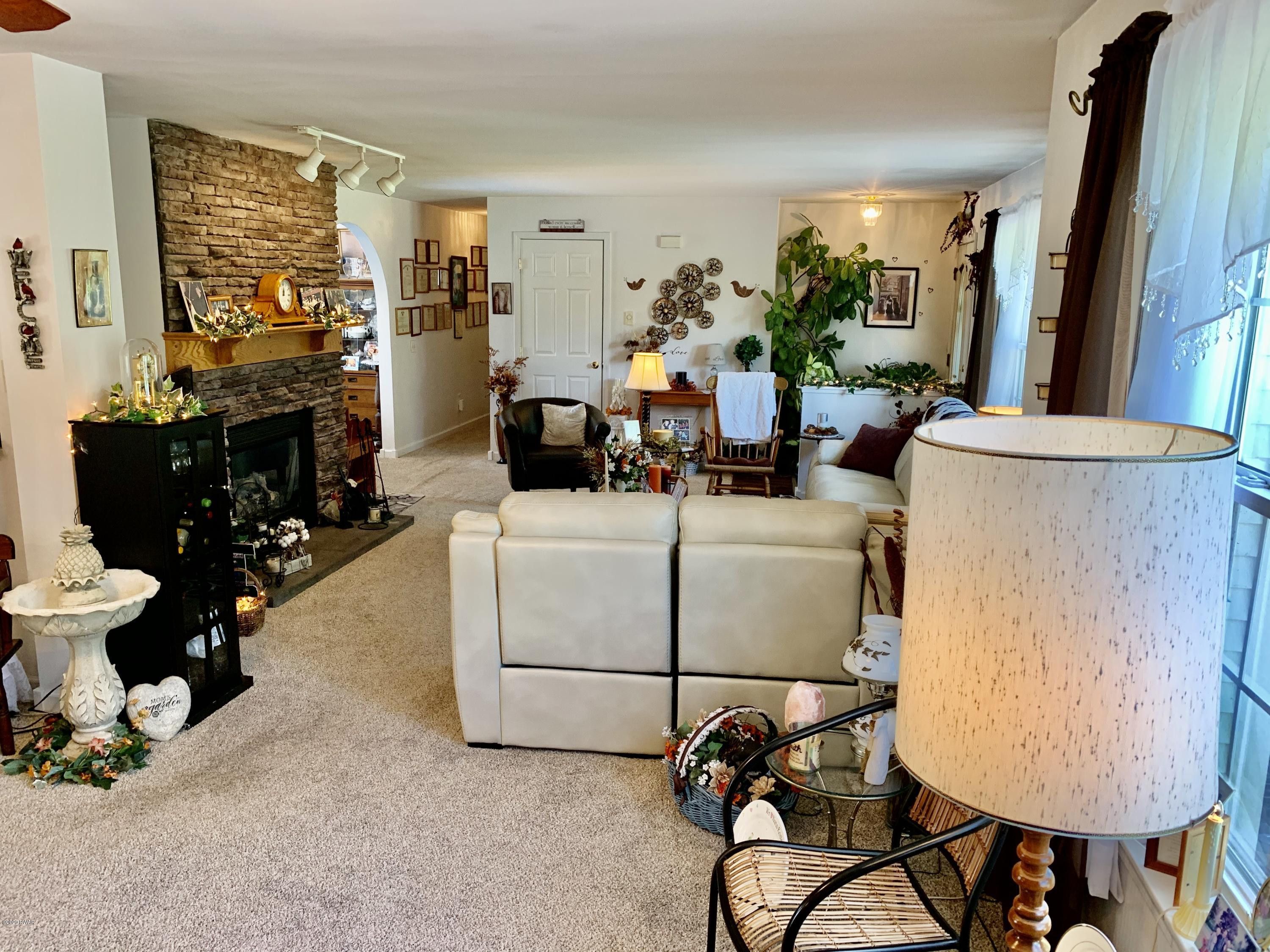 678 Stock Farm Road Lake Ariel, PA 18436 - Photo 16 of 41 a living room with furniture and a window